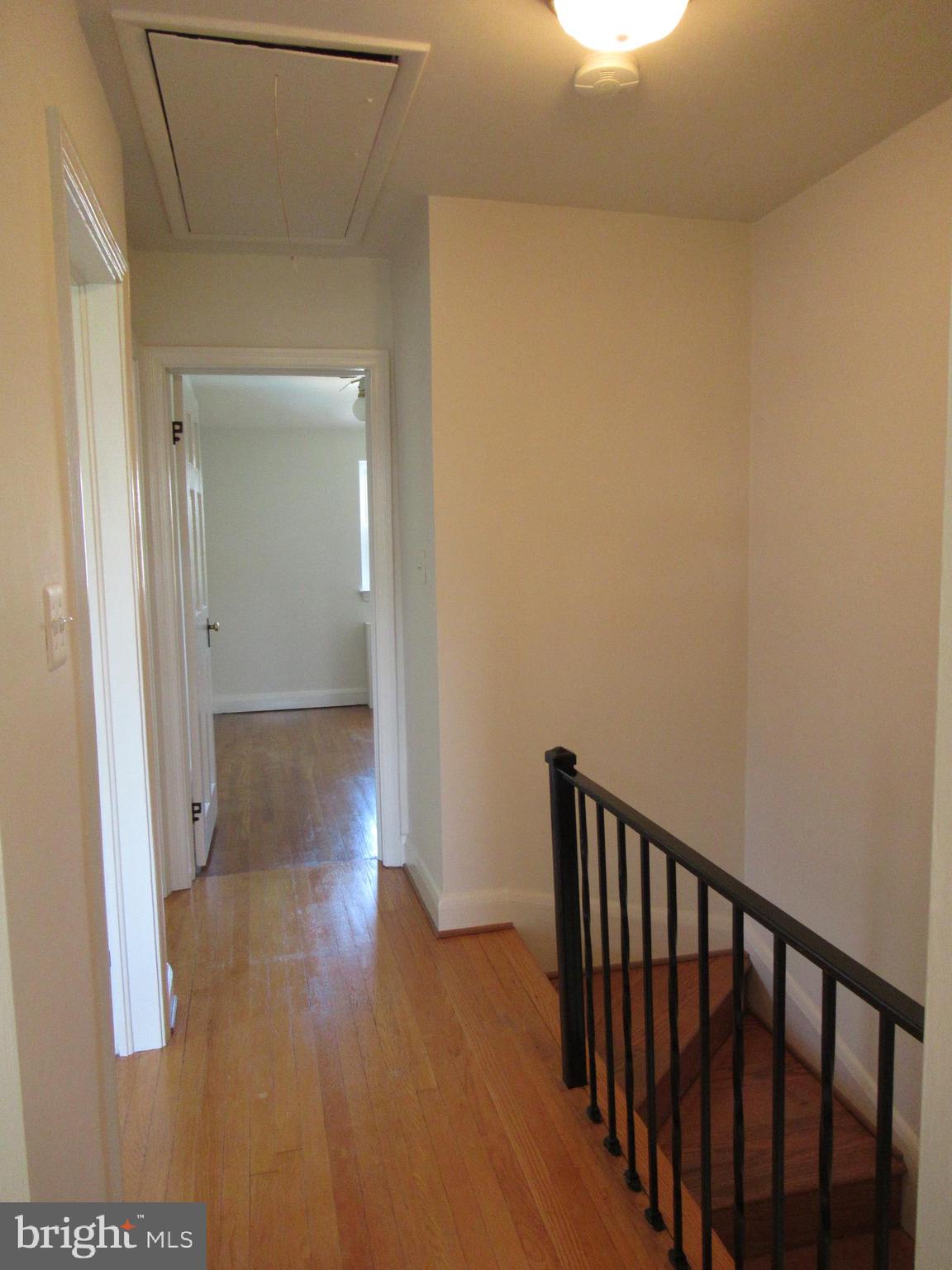 226 Ridge Avenue Towson, MD 21286 - Photo 14 of 32 Upstairs hall has attic with pull down stairs