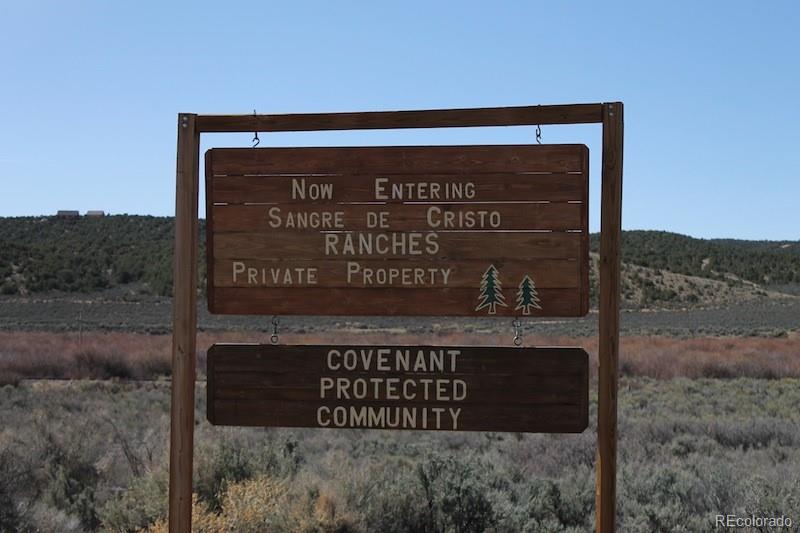 6521 Forbes Road San Luis, CO 81152 - Photo 3 of 12 a sign on the side of the building
