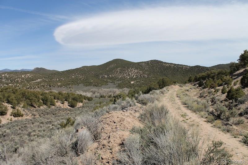6521 Forbes Road San Luis, CO 81152 - Photo 10 of 12 a view of a mountain in the distance in a field