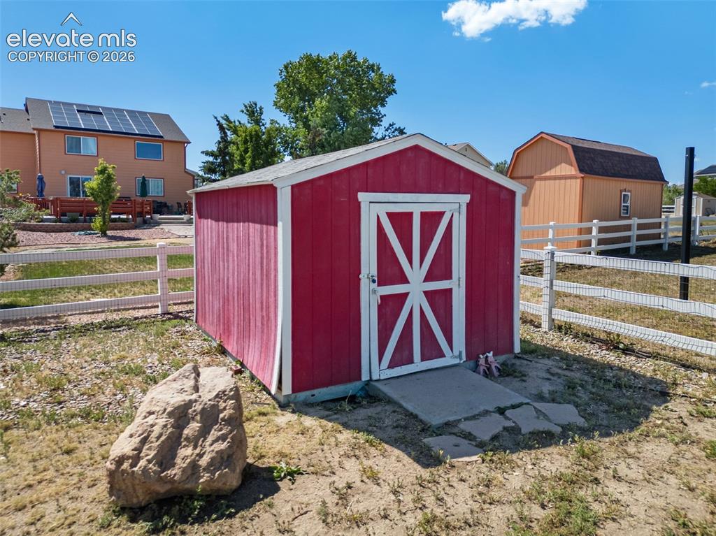 7840 Midnight Road Peyton, CO 80831 - Photo 43 of 48 A 15'x10' shed for garden tools and storage