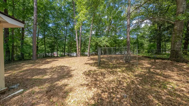 a view of road with trees