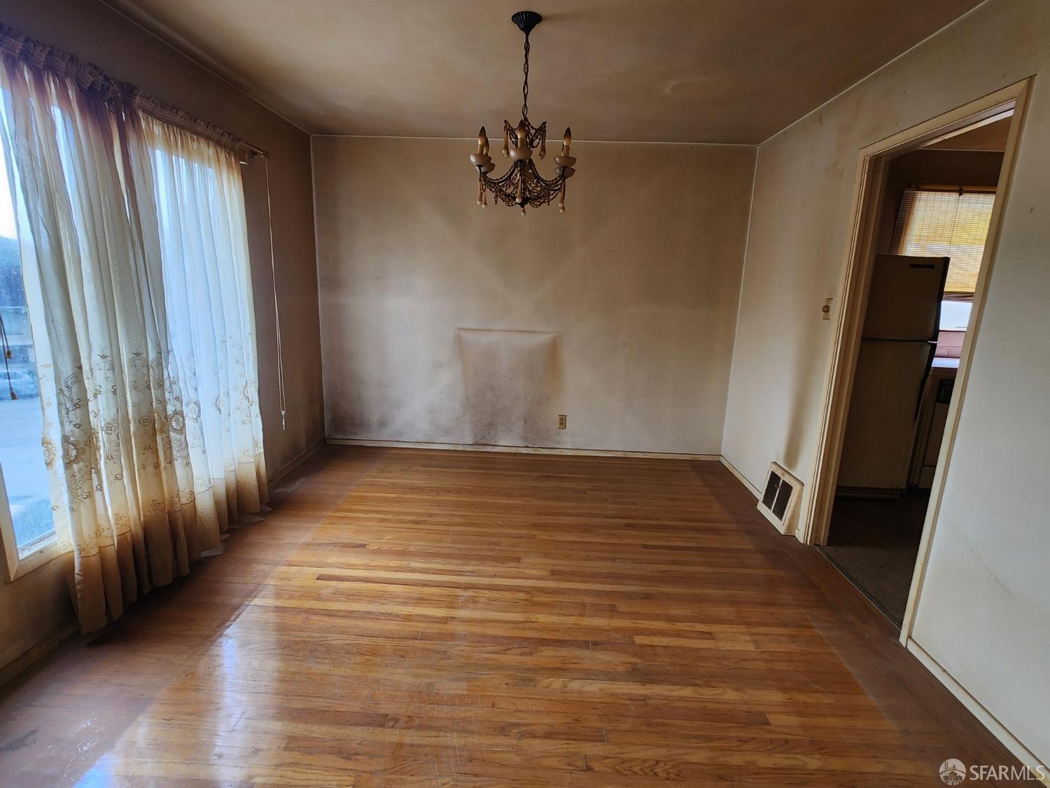 9 Clairview Court San Francisco, CA 94131 - Photo 4 of 16 a view of a room with wooden floor and large windows