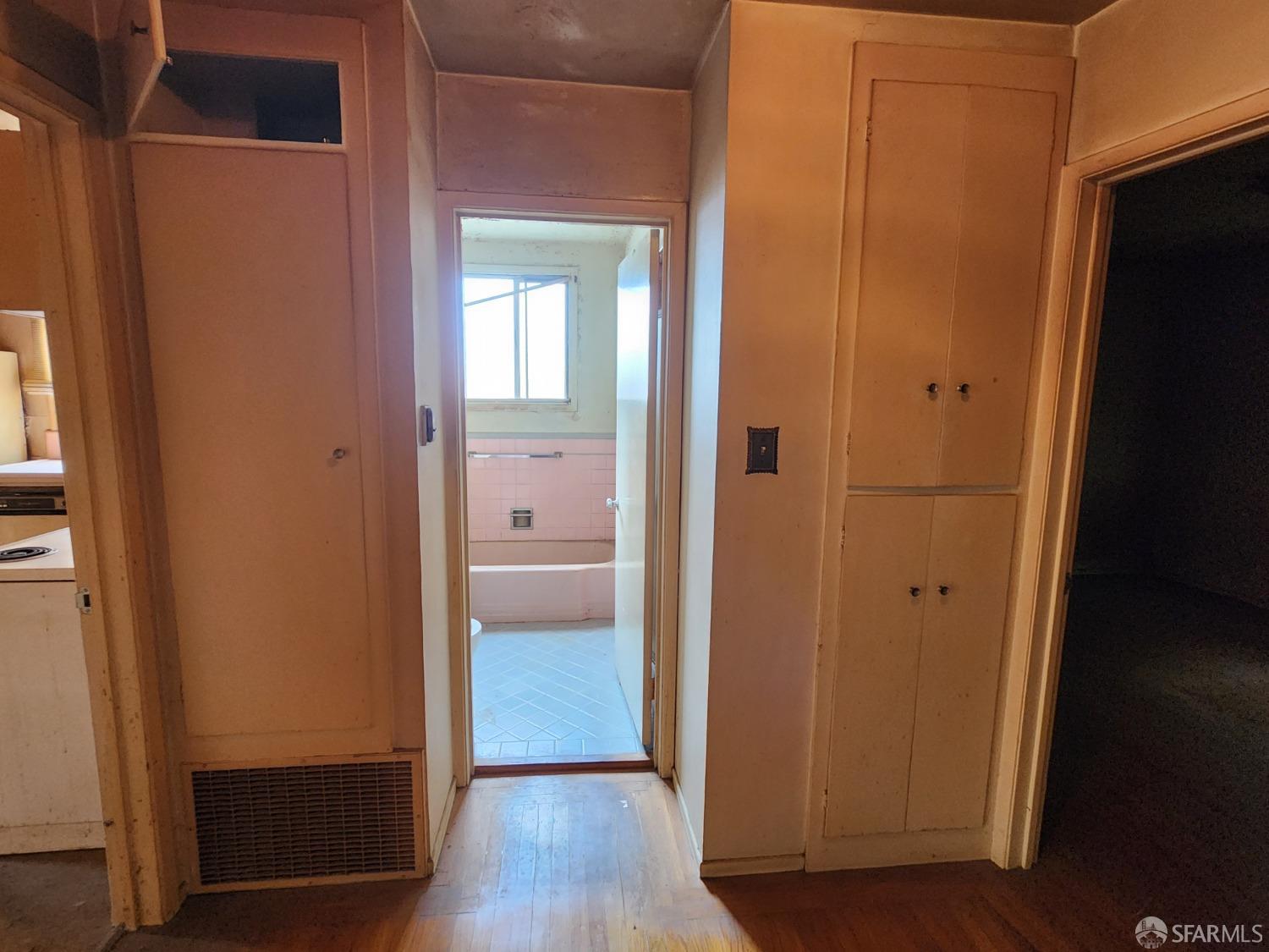 9 Clairview Court San Francisco, CA 94131 - Photo 7 of 16 a view of a hallway with wooden floor
