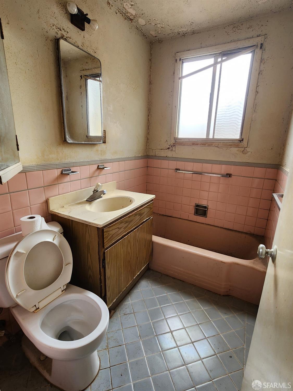 9 Clairview Court San Francisco, CA 94131 - Photo 8 of 16 a bathroom with a sink and a mirror