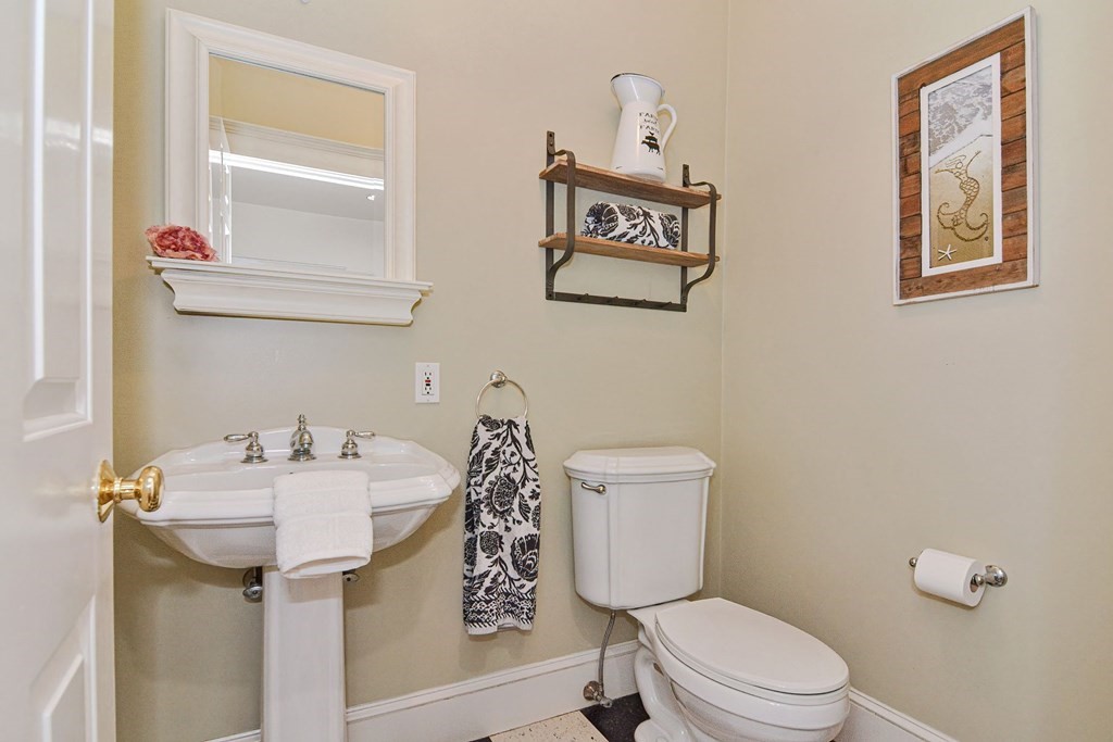 40 Brooks Station Road Princeton, MA 01541 - Photo 18 of 42 a bathroom with a toilet sink and mirror