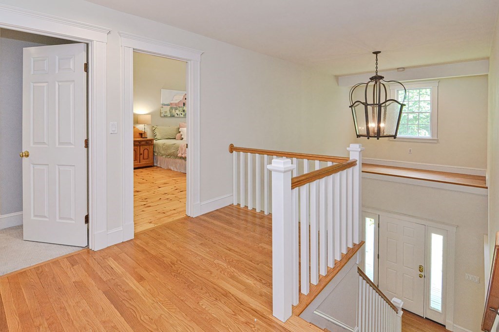 40 Brooks Station Road Princeton, MA 01541 - Photo 19 of 42 a view of a hallway to a bedroom and wooden floor