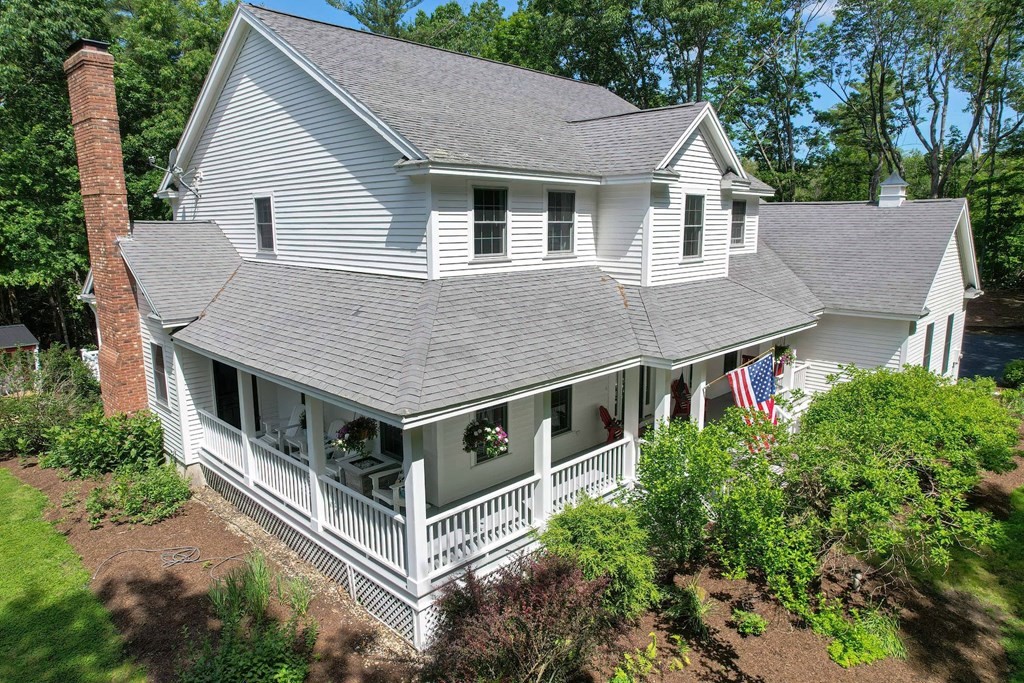 40 Brooks Station Road Princeton, MA 01541 - Photo 2 of 42 a aerial view of a house with yard and trees in the background