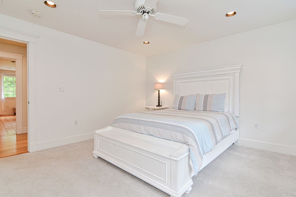 40 Brooks Station Road Princeton, MA 01541 - Photo 23 of 42 a spacious bedroom with a bed and a window