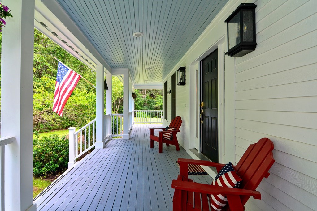 40 Brooks Station Road Princeton, MA 01541 - Photo 3 of 42 a balcony with wooden floor and outdoor seating