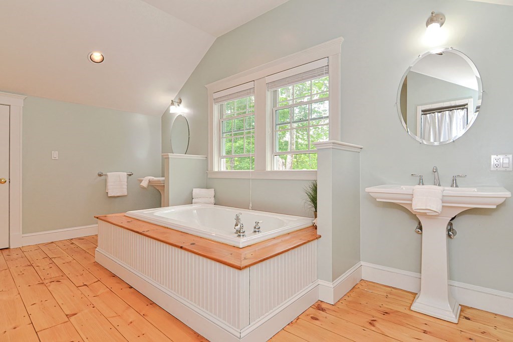 40 Brooks Station Road Princeton, MA 01541 - Photo 34 of 42 a bathroom with a sink and a mirror