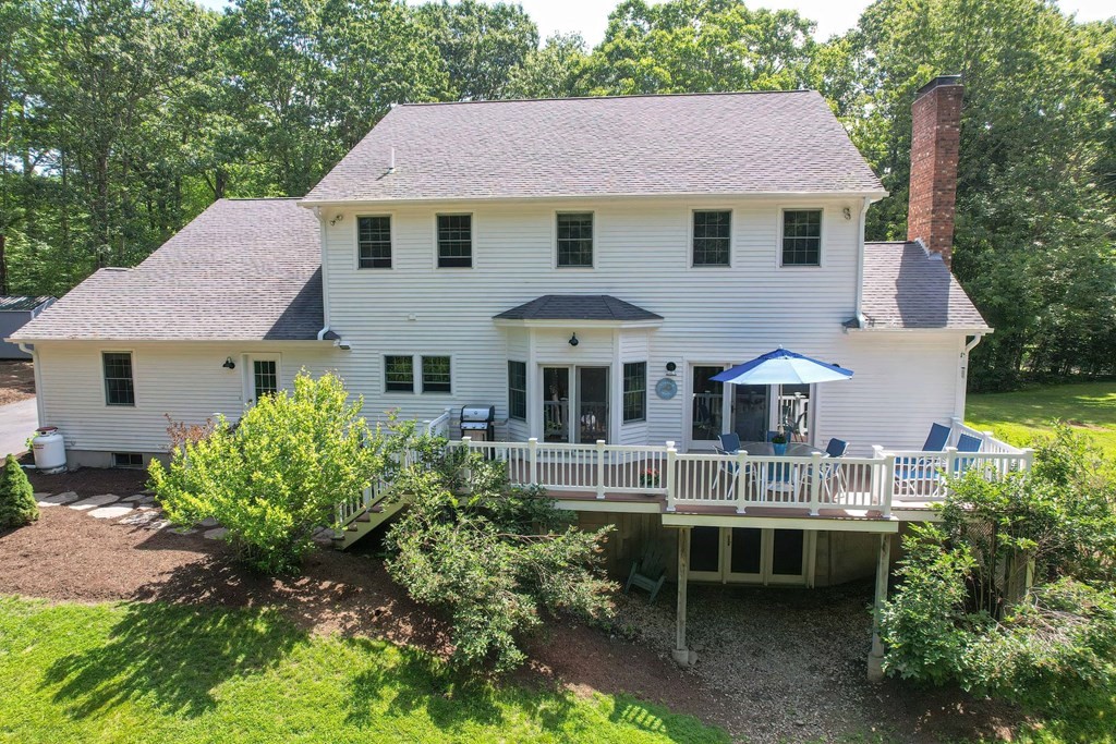 40 Brooks Station Road Princeton, MA 01541 - Photo 37 of 42 a front view of a house with a garden