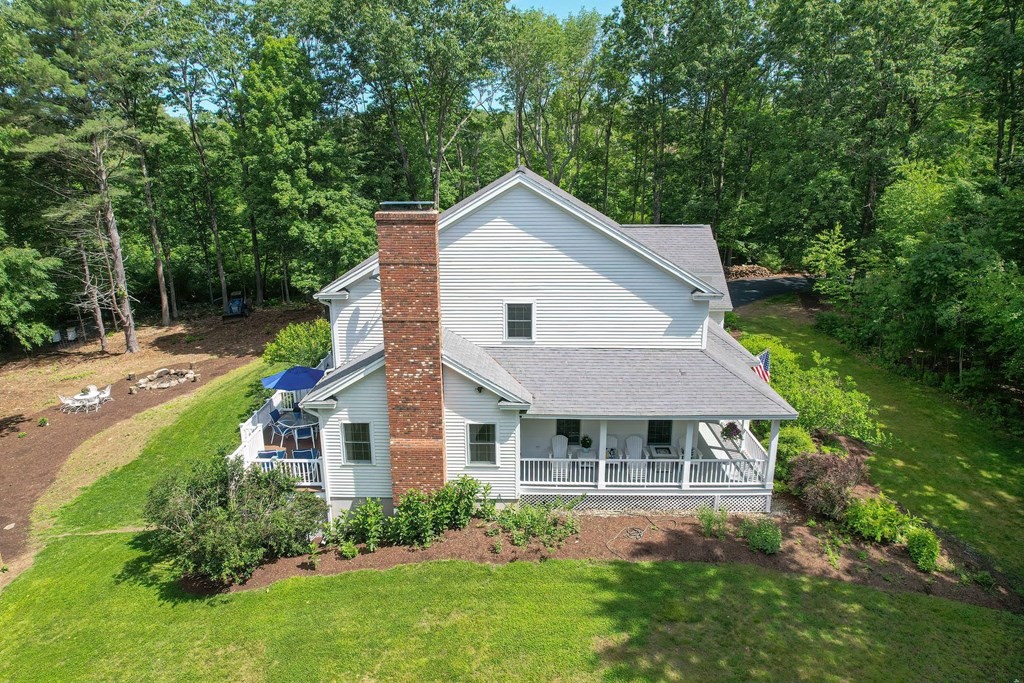 40 Brooks Station Road Princeton, MA 01541 - Photo 38 of 42 a aerial view of a house next to a yard
