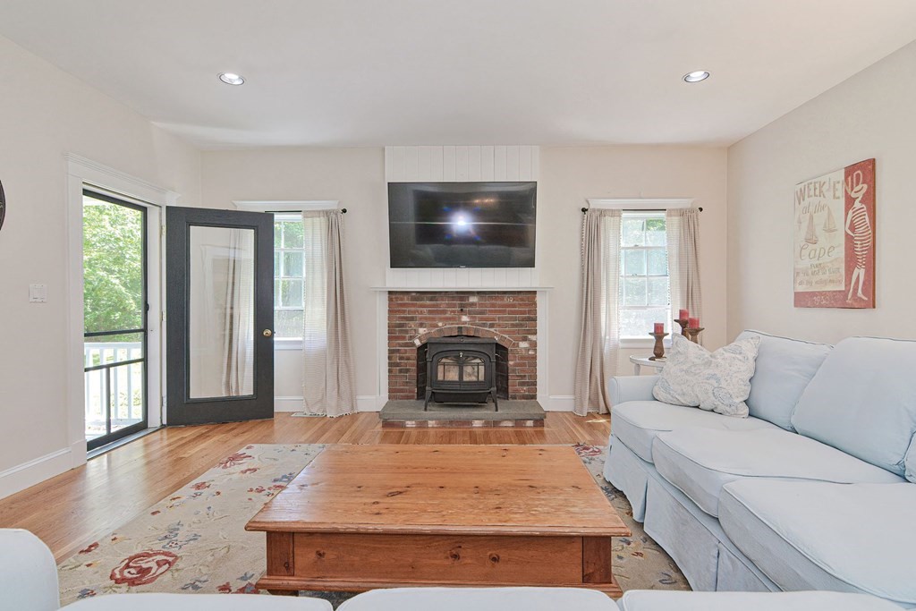 40 Brooks Station Road Princeton, MA 01541 - Photo 7 of 42 a living room with furniture and a fireplace
