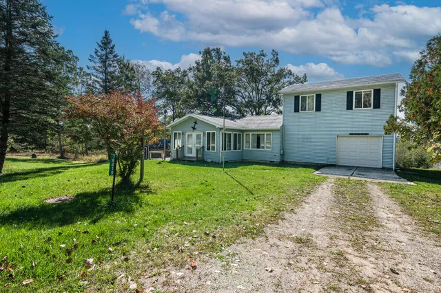 $389,900 | 19419 Bullhead Lake Drive, Rodney, MI 49342