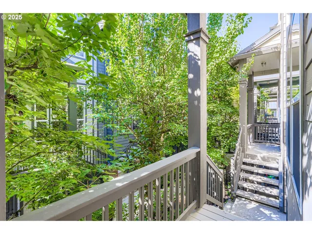 a view of a porch with a tree