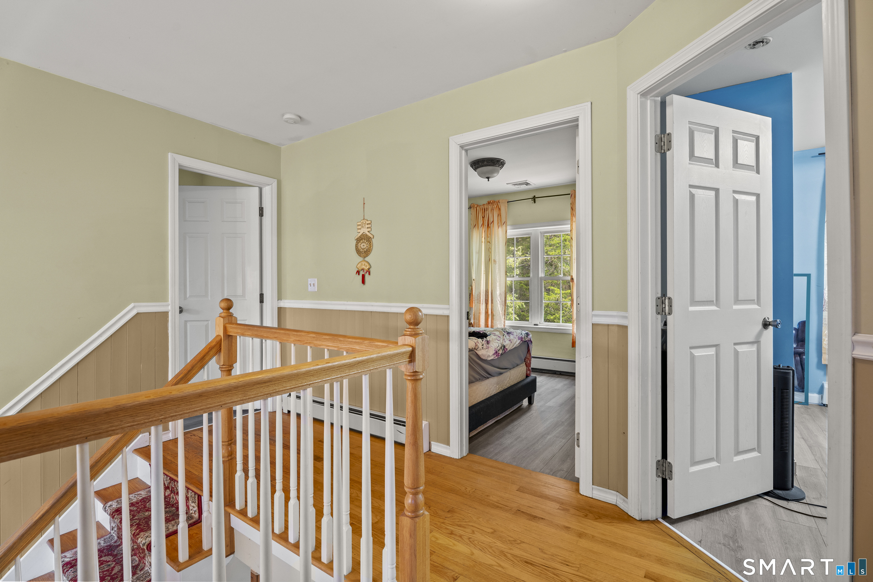 52 Middle Road Preston, CT 06365 - Photo 19 of 39 a view of an entryway wooden floor and a living room