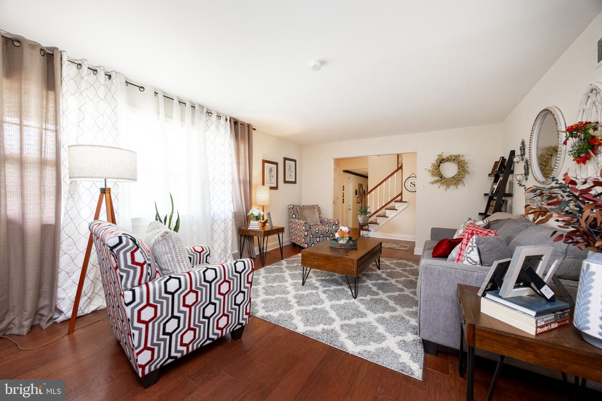 926 Pierce Road Norristown, PA 19403 - Photo 11 of 54 a living room with furniture and a wooden floor