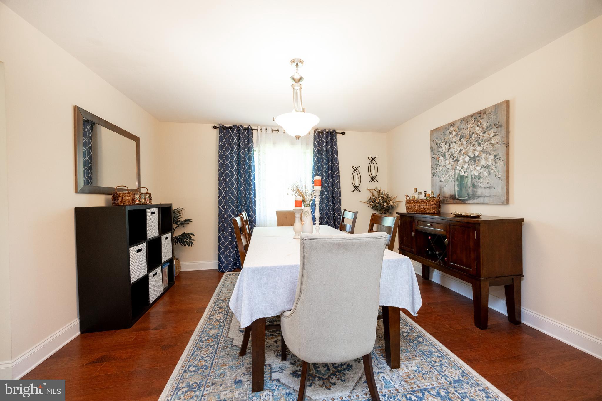 926 Pierce Road Norristown, PA 19403 - Photo 12 of 54 a living room with furniture a dining table and a piano table