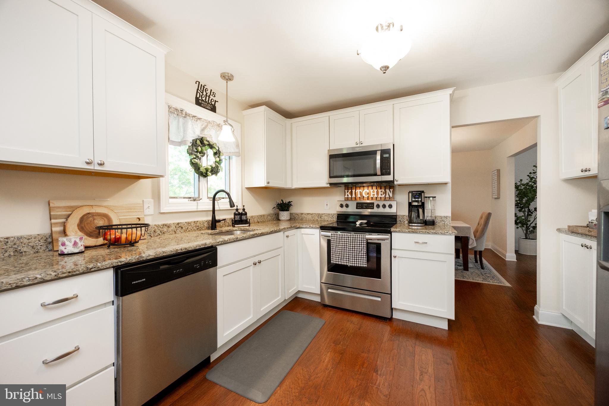 926 Pierce Road Norristown, PA 19403 - Photo 16 of 54 a kitchen with granite countertop a sink and steel appliances