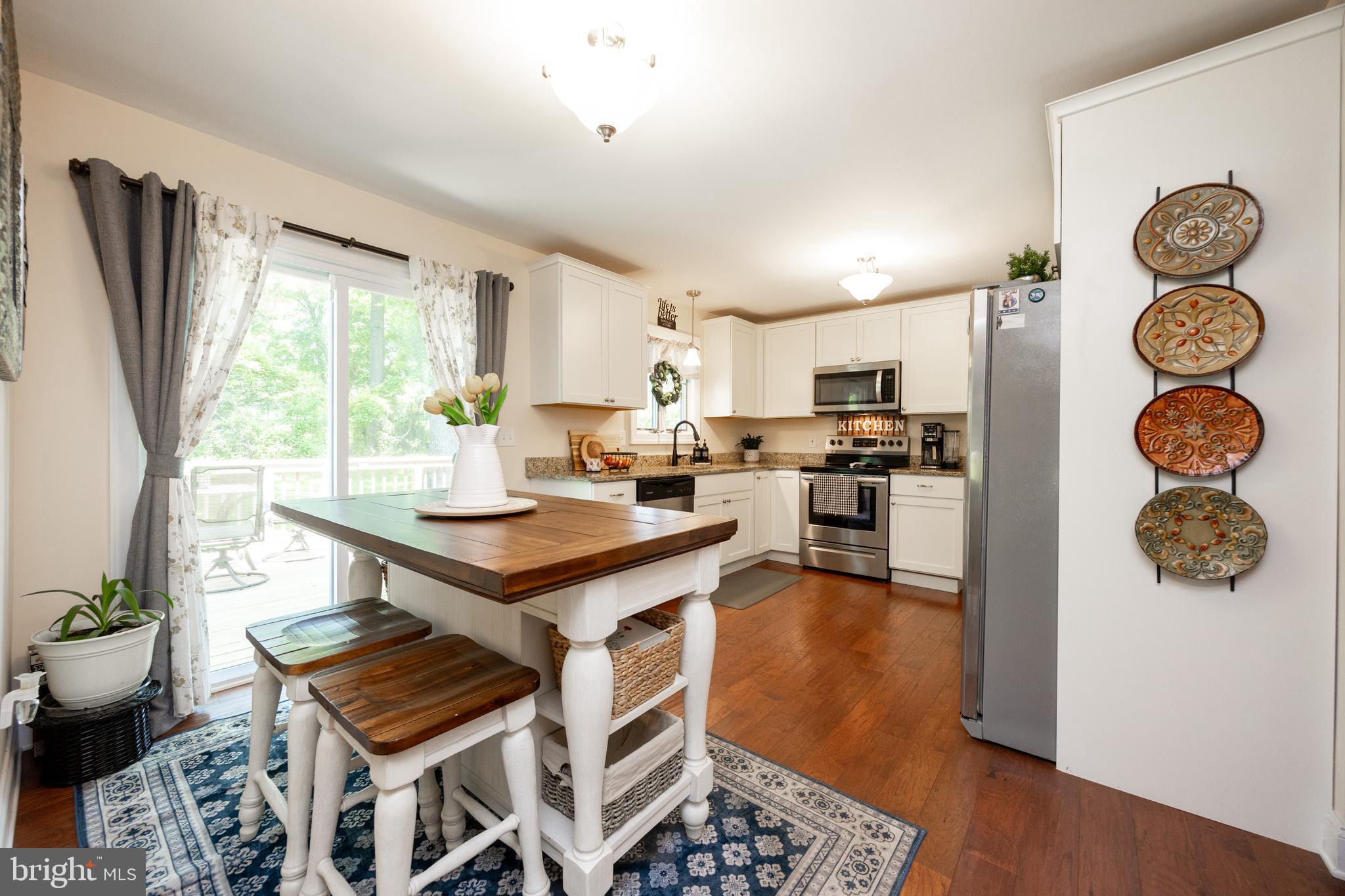 926 Pierce Road Norristown, PA 19403 - Photo 17 of 54 a kitchen with a table and chairs in it