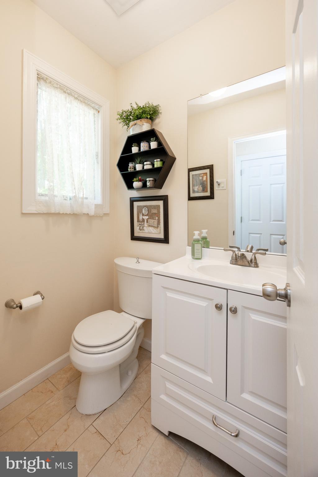 926 Pierce Road Norristown, PA 19403 - Photo 22 of 54 a bathroom with a sink toilet and mirror