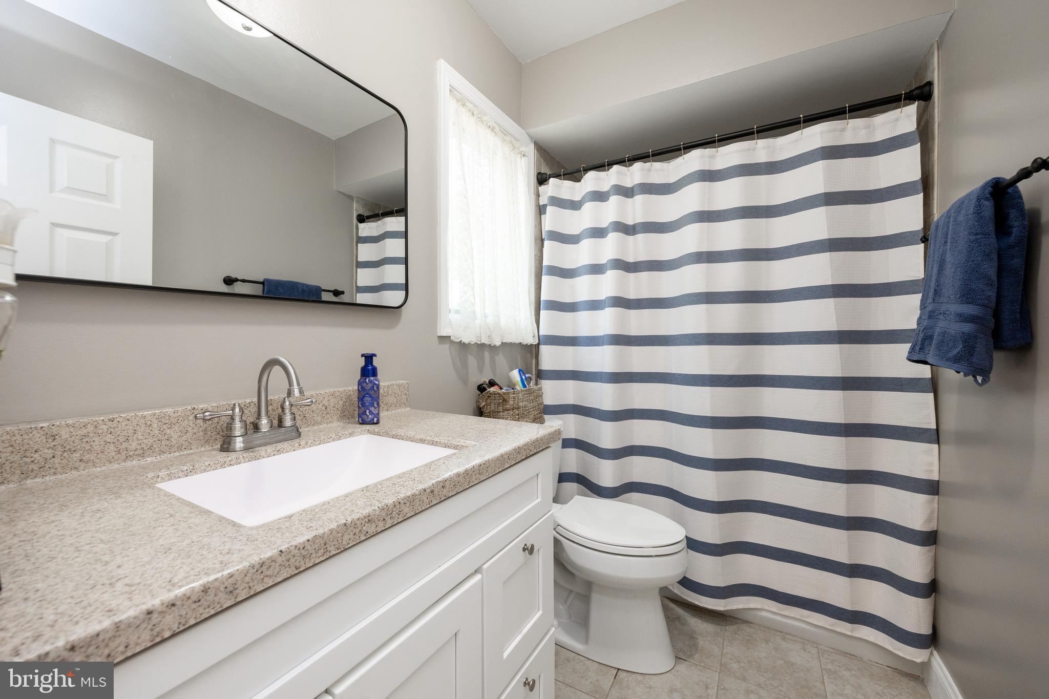926 Pierce Road Norristown, PA 19403 - Photo 30 of 54 a bathroom with a sink toilet and shower
