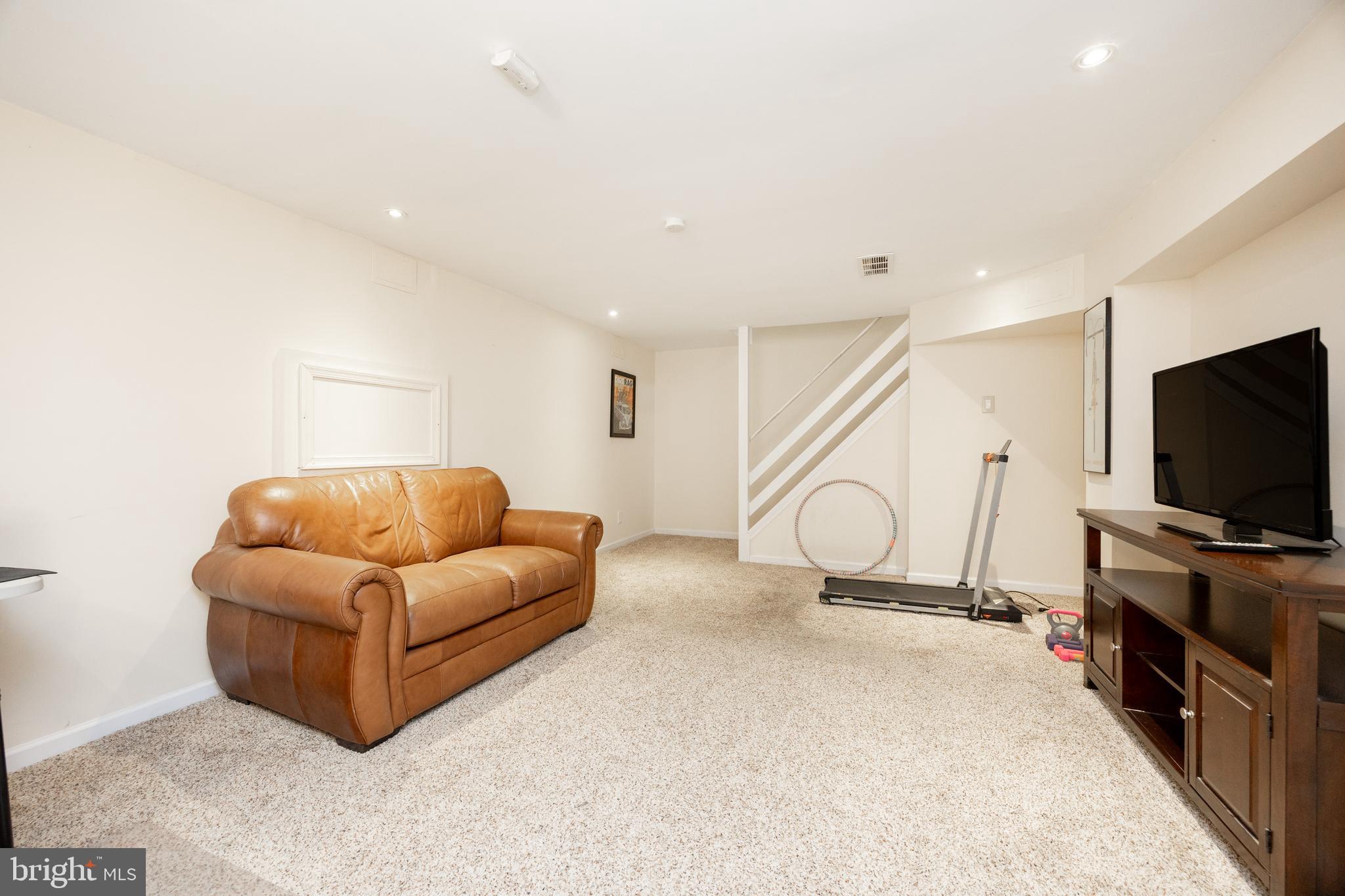 926 Pierce Road Norristown, PA 19403 - Photo 32 of 54 a living room with furniture and a flat screen tv
