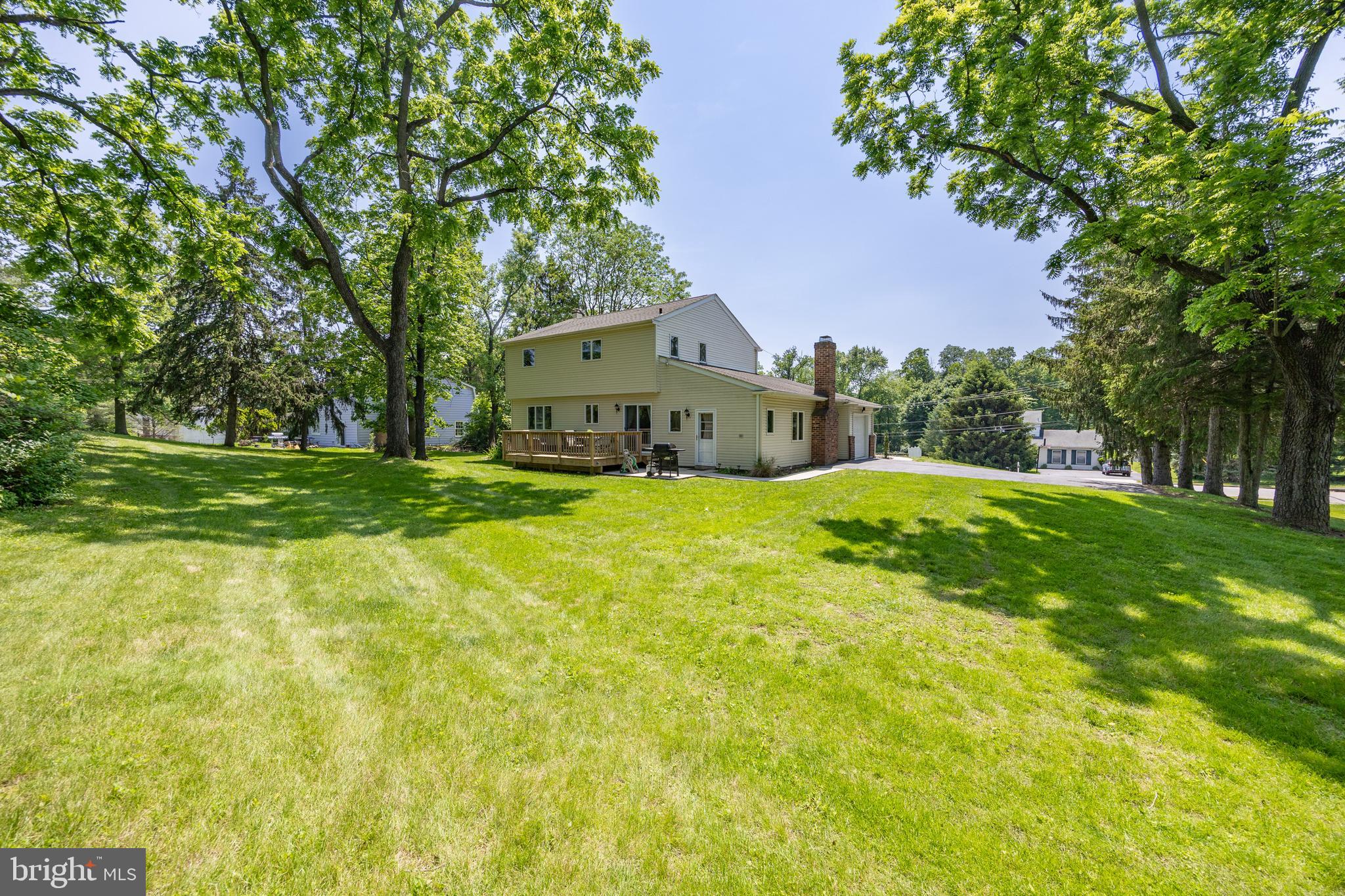 926 Pierce Road Norristown, PA 19403 - Photo 39 of 54 a view of a big house with a big yard and large trees