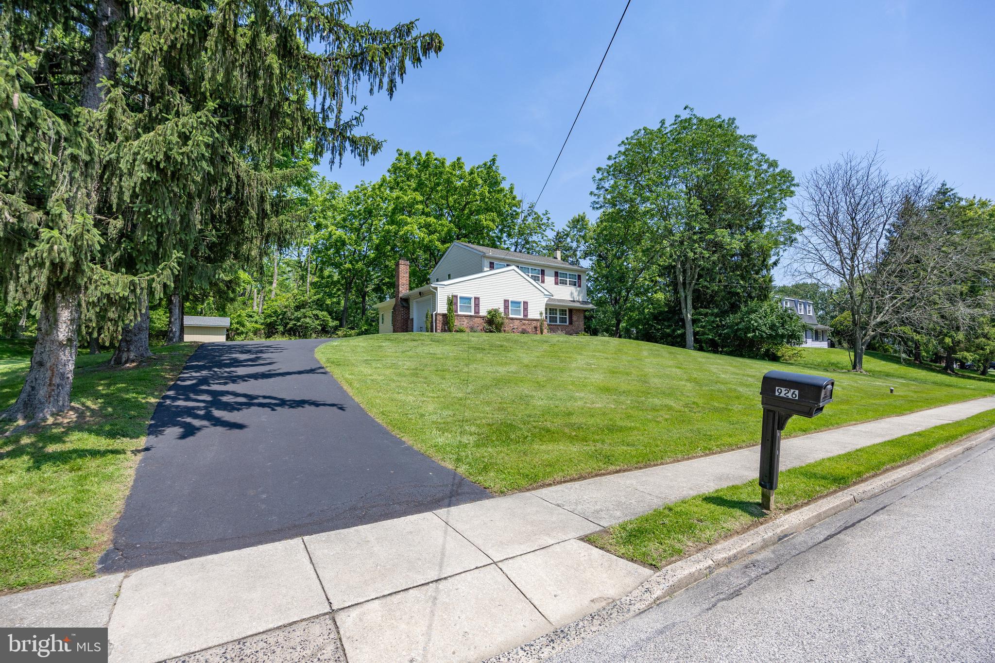 926 Pierce Road Norristown, PA 19403 - Photo 45 of 54 a front view of a house with garden
