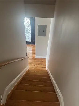a view of entryway with wooden floor
