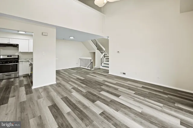a view of a kitchen with a sink