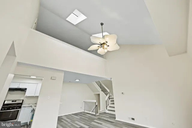 a kitchen with a sink stove and refrigerator