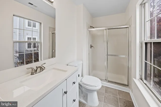 a view of wooden floor in an empty room
