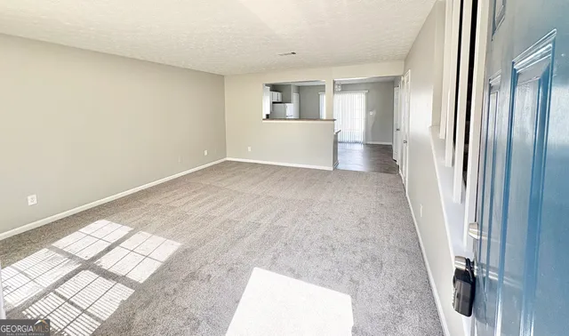 an empty room with windows