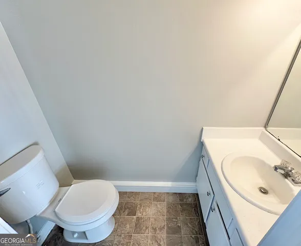 a bathroom with a sink and a toilet