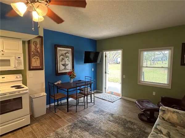 a workspace with furniture and window