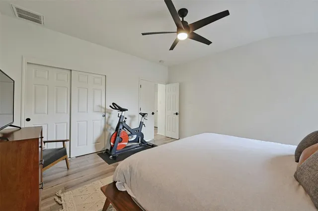 a bathroom with a bathtub sink and mirror
