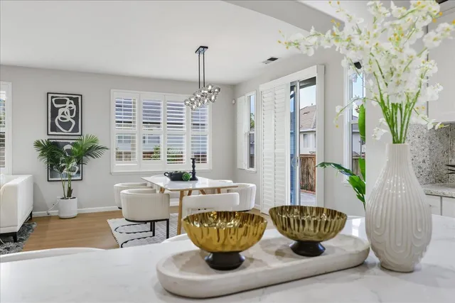 a kitchen with a stove and a white cabinets