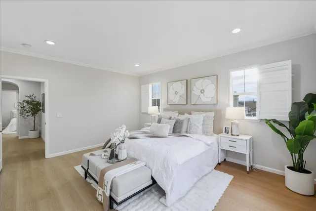 a bathroom with a tub shower and sink