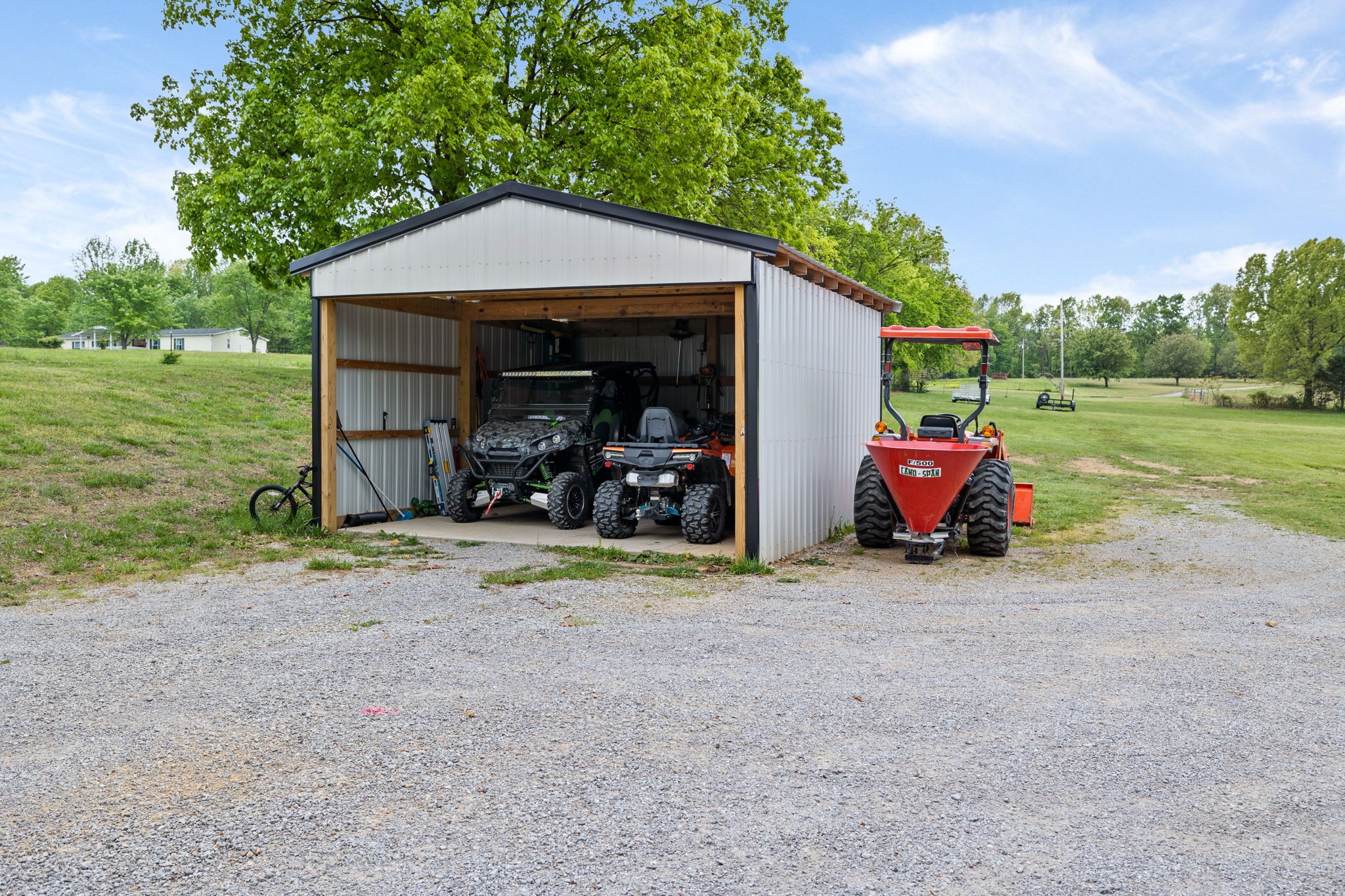 188 Switchboard Road Portland, TN 37148 - Photo 31 of 48 a view of a house with a yard and sitting area