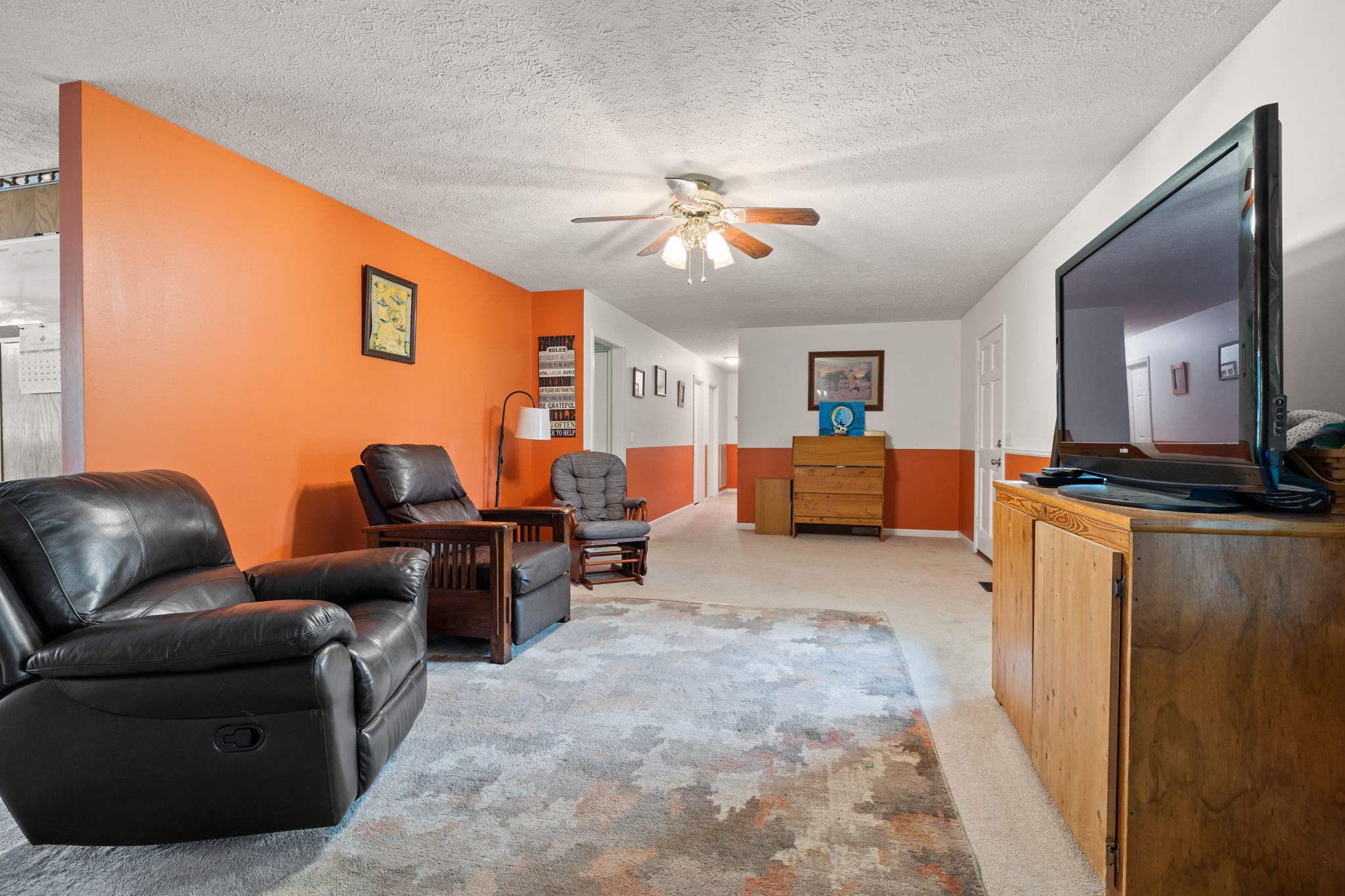 188 Switchboard Road Portland, TN 37148 - Photo 7 of 48 a living room with furniture and a chandelier