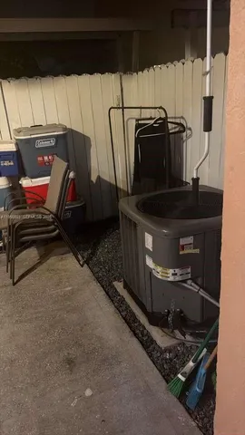 a view of a workspace with furniture