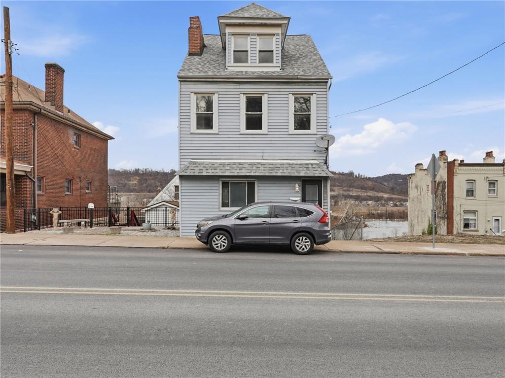 7307 Butler Street Pittsburgh, PA 15206 - Photo 31 of 35 a view of a car parked in front of a house
