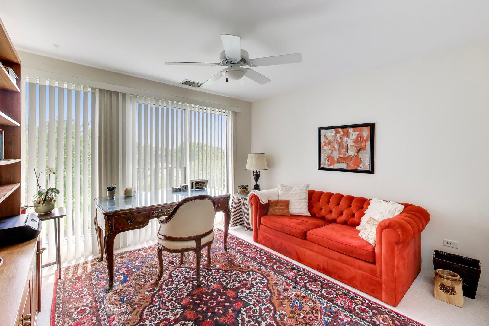495 Milford Road Deerfield, IL 60015 - Photo 23 of 33 a living room with furniture and a large window