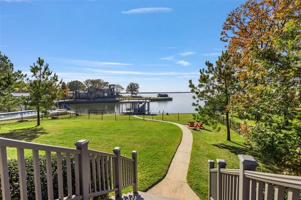 a view of a garden and deck