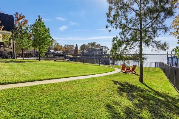 a view of a park with a house
