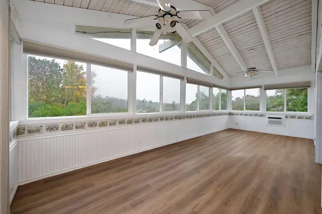 en empty room with windows