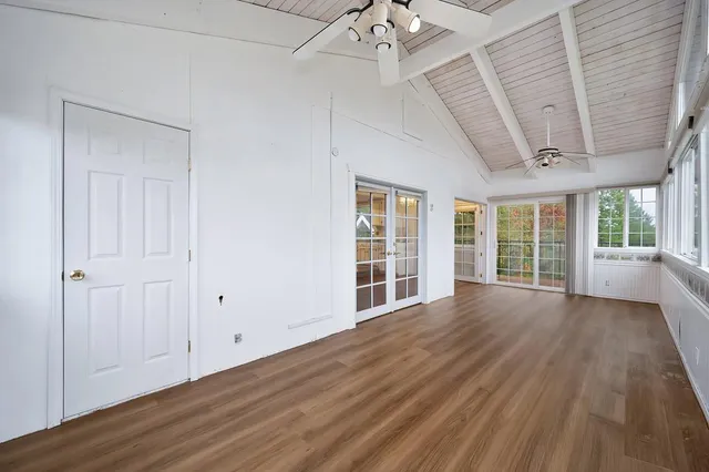 a spacious bathroom with a double vanity sink mirror and