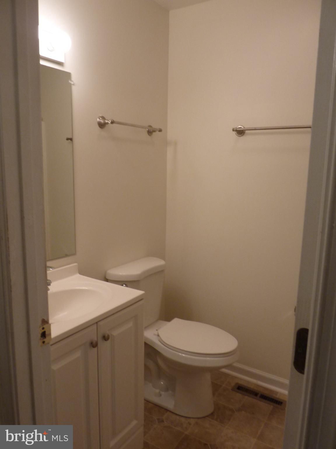 309 Decatur Avenue Salisbury, MD 21804 - Photo 12 of 15 a white toilet sitting next to a white sink