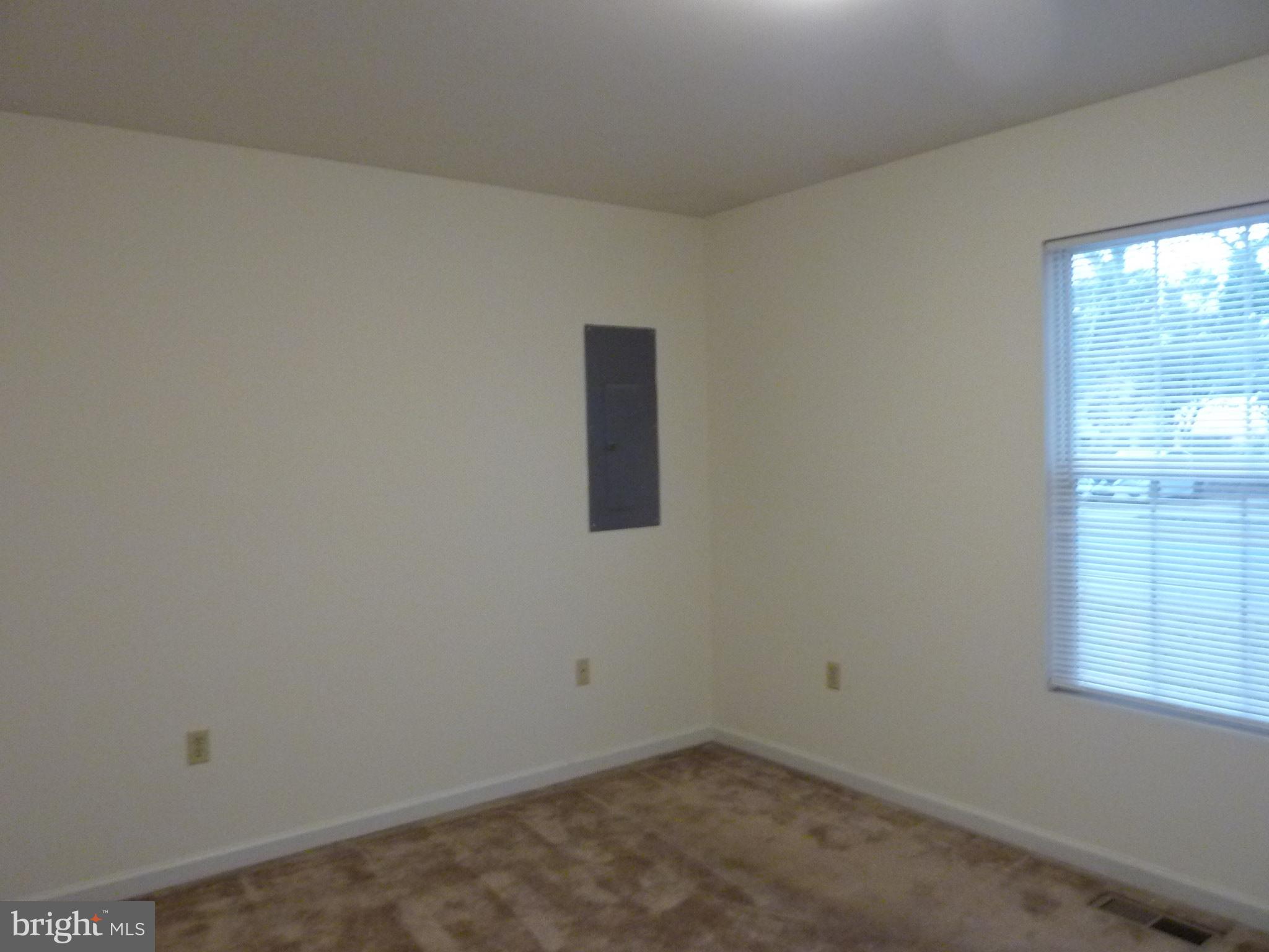 309 Decatur Avenue Salisbury, MD 21804 - Photo 15 of 15 an empty room with windows